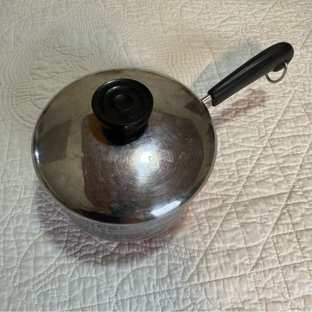 Revere Ware Silver 1 quart Saucepan with Black Handle and lid